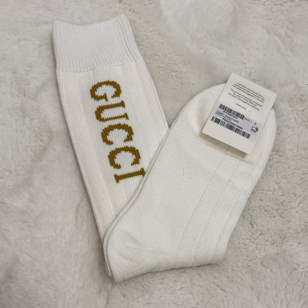 Gucci Cream Socks with Gold Lettering